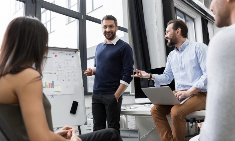 Business coworkers discussing new ideas and brainstorming in office