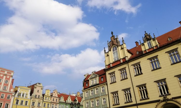 A beautiful shot of a white building in the Main Market Square of Wroclaw, Poland