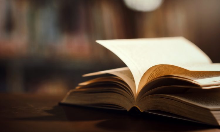 Book in library with open textbook,education learning concept