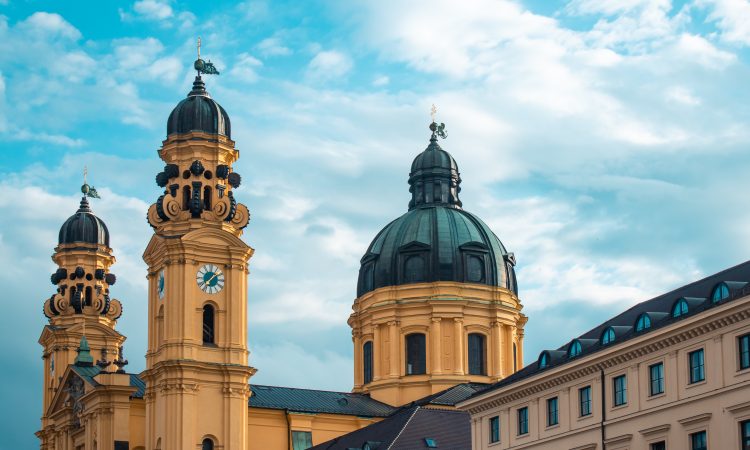 theatine-church-sunlight-cloudy-sky-munich-germany