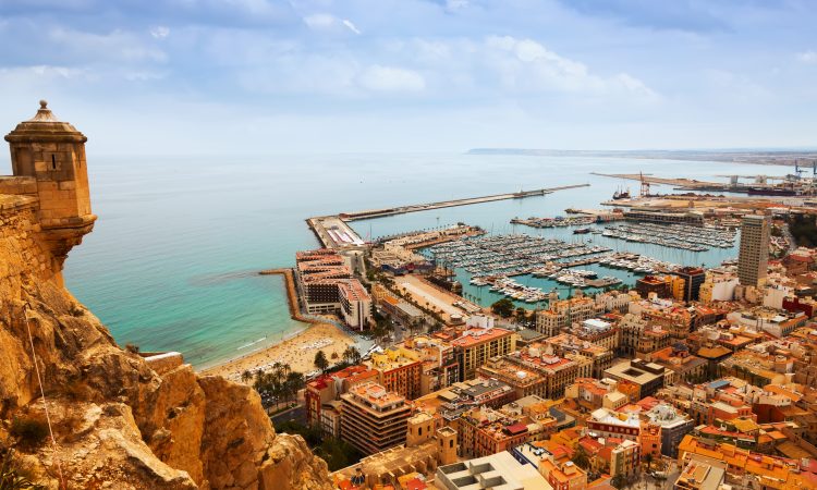 Top view of Port in Alicante with docked yachts from castle. Spain