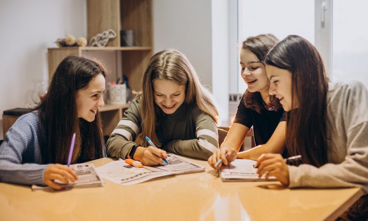 Group of kids studying at school