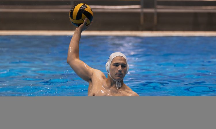 male-athlete-playing-water-polo-indoor-pool