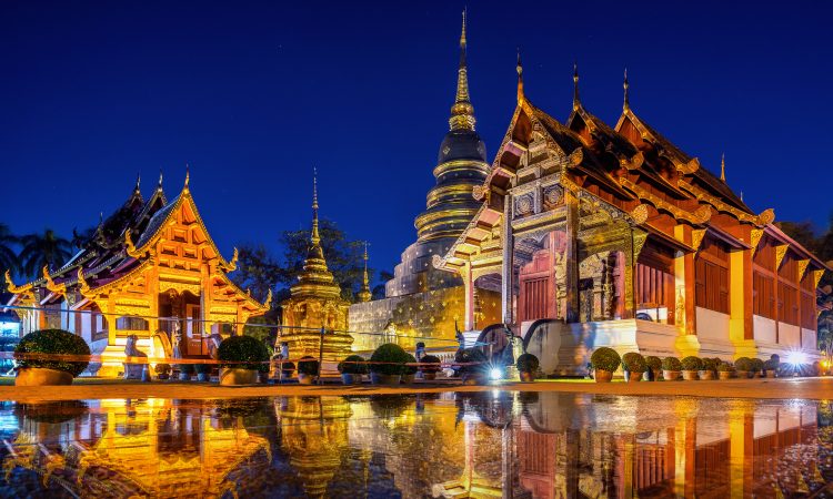 Wat Phra Singh temple at night in Chiang Mai, Thailand.